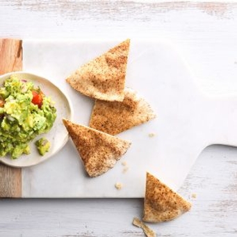 guacamole and pita bread slices